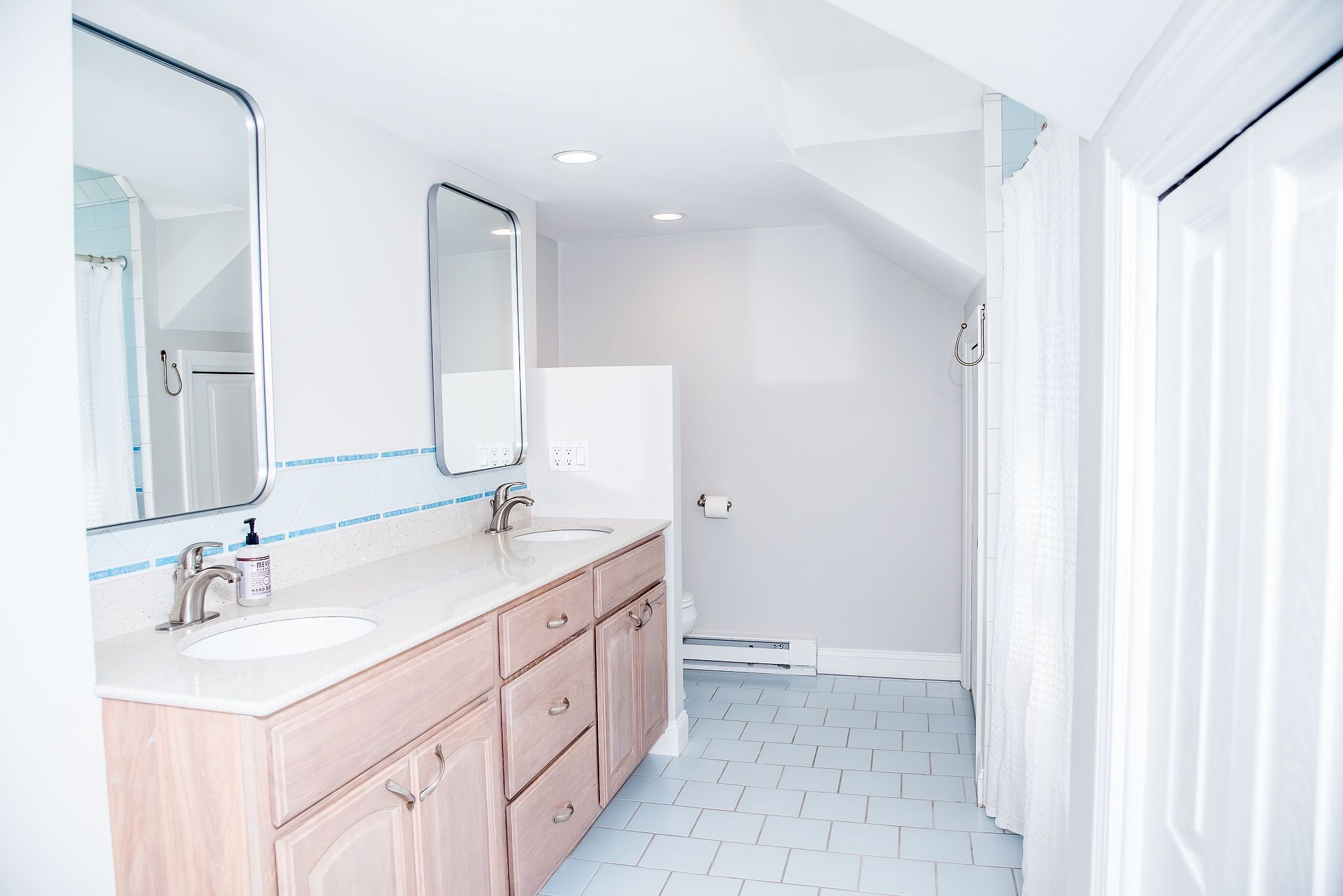 Left Wing Full Bathroom/Shower with Double Vanity