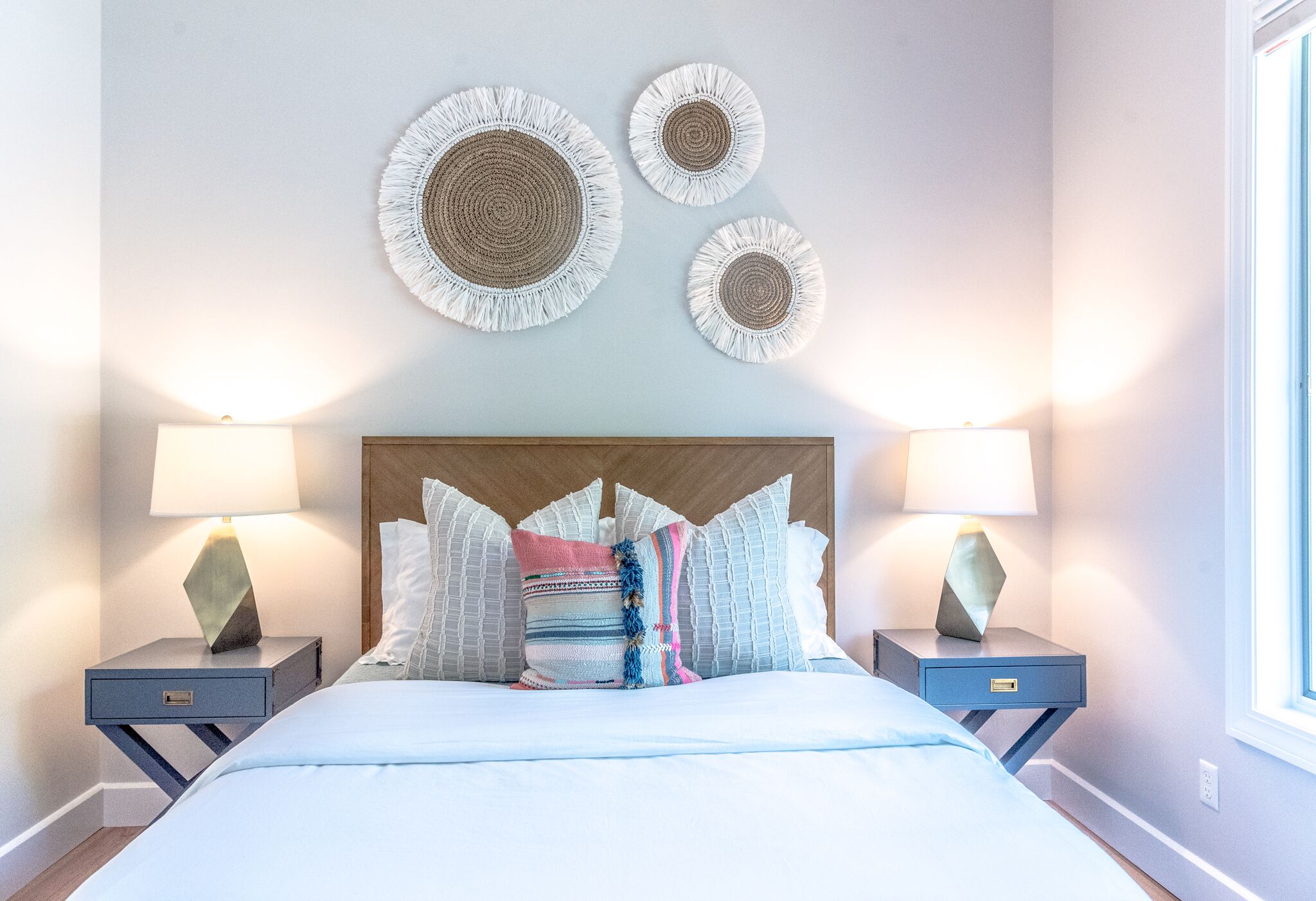 "Beachy Boho Bedroom" Queen sized bed with great lighting for a late night book